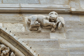 Sculpture of an animal on the facade of the medieval basilica Sainte-Marie-Madeleine in Vézelay, Burgundy, Morvan, France