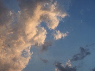 dramatic blue sky at sunset with clouds background