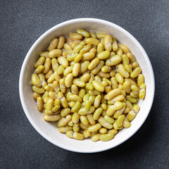 Canned thin white bean flageolet vegetables fresh dish healthy meal food snack diet on the table...