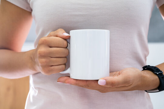 Woman Holding Coffee Mug