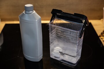 Scale deposits in the water container for the coffee machine and hard water cleaner
