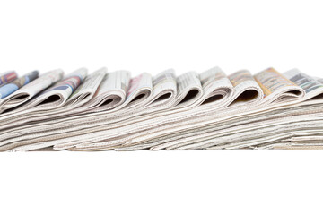 Assortment of generic folded newspapers isolated cut out