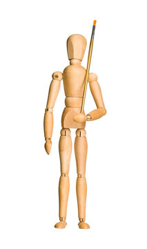 Wooden model dummy holding paintbrush