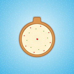 Sweet ginger cookies in the shape of a Christmas tree toy.