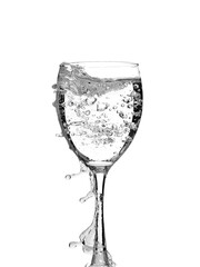 transparent glass glass with water splashes isolated on a white background