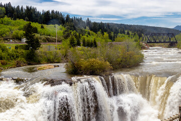 Thunder water over the falls in early spring. Lundbeck Falls PRA, Alberta, Canada