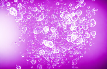 Abstract background and texture of blue bubbles with light illumination. Purple fantasy shapes
