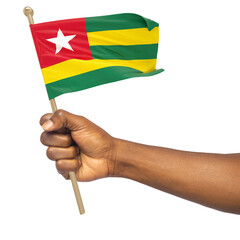 Hand holding Togolese national flag isolated on white background