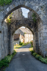 View of double arch Gothic medieval city gate at Yevre le chatel castle in France