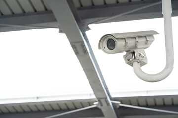 CCTV surveillance security camera video equipment on pole outdoor building safety system area...