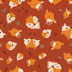Tile of hand drawn seamless fox heads. Seamless pattern motif creative print, woodland, with fall leaves and autumn foliage. Seamless texture for textile, fabric, apparel, wrapping, paper, stationery.