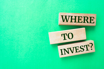 Wooden blocks with words 'Where to Invest?'.