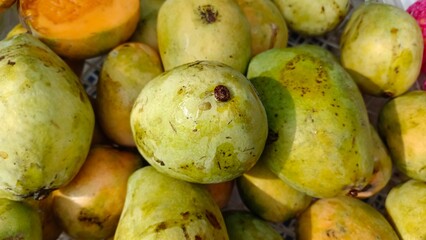 Gedong mango is green, bright orange and the texture of the flesh is soft