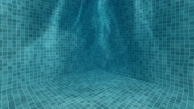 Bottom of the swimming pool. Clear water background with the reflection of sun rays underwater. Amazing view from underwater. Inflowing water jet into a swimming pool with blue tiles.