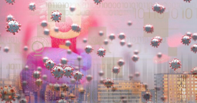 Covid-19 cells against cityscape in background - Powered by Adobe