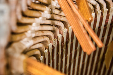 Electric engine stator with copper bus bars and fabric