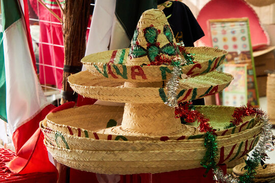 Mexican sombreros are wide brim hats sold at market in Mexico