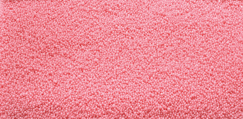 red pearls of bath bubble salt abstract background. template for product presentation, sale or advertising. small shining balls textured background.