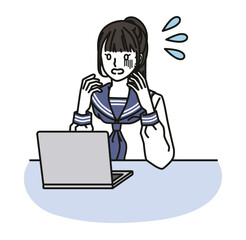 パソコンの画面を見て焦る女子中学生・高校生