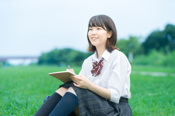 Obraz premium 勉強する女子高生