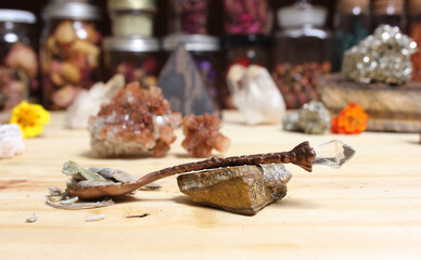 Sage in Vintage Spoon on Meditation Altar With Pyramid in Background