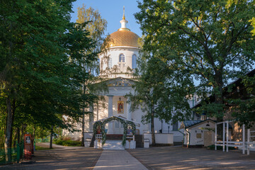 Fototapeta na wymiar View of the St. Michael's Cathedral of the Holy Dormition Pskov-Pechersk Monastery on a sunny summer day, Pechory, Pskov region, Russia