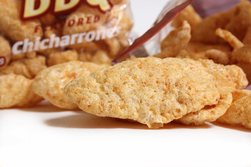 Chicharrones is Spanish for Fried Pork Skin Bag in Background Shallow DOF