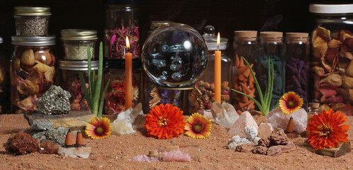 Crystal Ball With Candles and Chakra Stones on Australian Red Sand