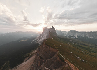 Stunning view of the Seceda ridge during a cloudy day. The Seceda with its 2.500 meters is the highest vantage point in Val Gardena, Dolomites, Italy. - obrazy, fototapety, plakaty