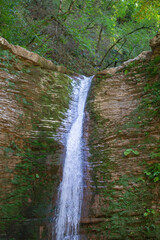 Fototapeta na wymiar Big waterfalls in the forest