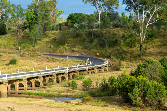 Road and bridge over Burnett River in rural Queensland.
