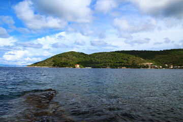 The landscape of the island of Vis, rocky beaches, steep cliffs, lonely islands

