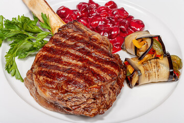 Grilled steak with zucchini and fresh herbs