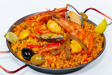 Spainsh dish seafood paella with rice, shrimps and mussels