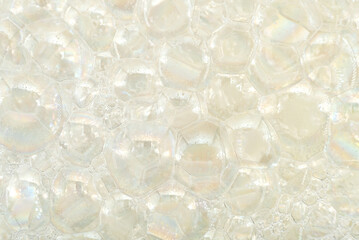 Texture, background from soap bubbles. Detergent or shampoo bubbles