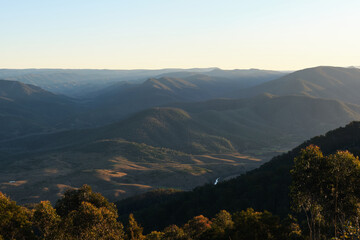 Sunset illuminating the tops of the Barrington Tops National Park from Thunderbolts Way lookout