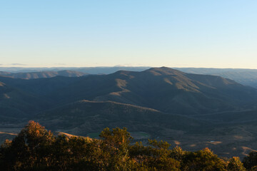 Sunset illuminating the tops of the Barrington Tops National Park from Thunderbolts Way lookout