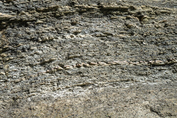 Rocky banks of the river as a pattern, texture, background