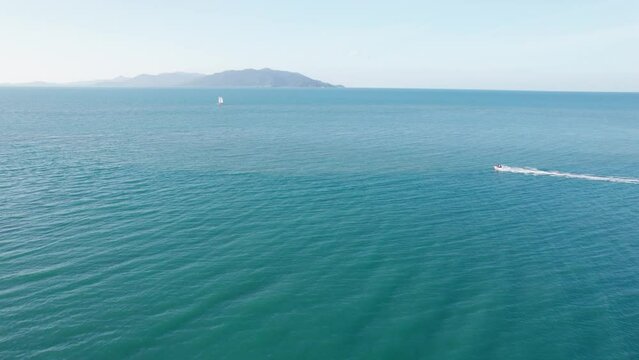 Aerial footage of people on hydrocycles ride in the open water