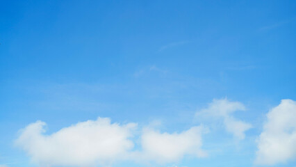 Blue sky background and white clouds soft focus at Phuket Thailand.