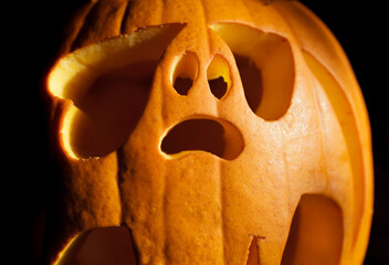 Halloween carved ghost pumpkin lantern. Creative pumpkin decorating ideas, scary spooky ghost...