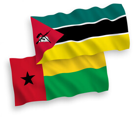 Flags of Republic of Mozambique and Republic of Guinea Bissau on a white background