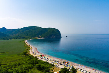 Montenegro. Coast of the Adriatic Sea. Auto camping on the beach. Summer. Tourist season. Rest on the sea. Drone. Aerial view