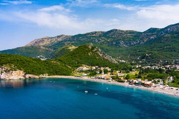 Montenegro. Coast of the Adriatic Sea. Auto camping on the beach. Summer. Tourist season. Rest on the sea. Drone. Aerial view