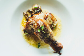 Truffle chicken with mushrooms (boletus edulis) and golden chanterelle (Cantharellus cibarius)