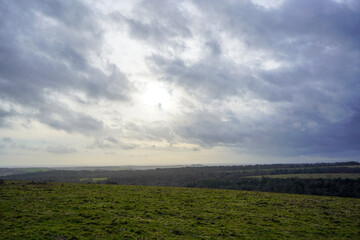 Views over overcast cloudy skies in the English countryside