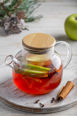 
fruit tea in a teapot on the table