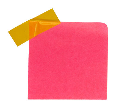 pink sticky note glued to the board with tape