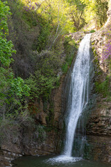 Fototapeta na wymiar A view of the Leghvtakhevi Waterfall in the Tbilisi Botanical Garden. Georgia country