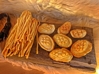 board of Polish oscypek cheeses in a mountain hut